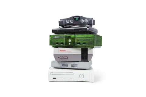 A stack of video game consoles