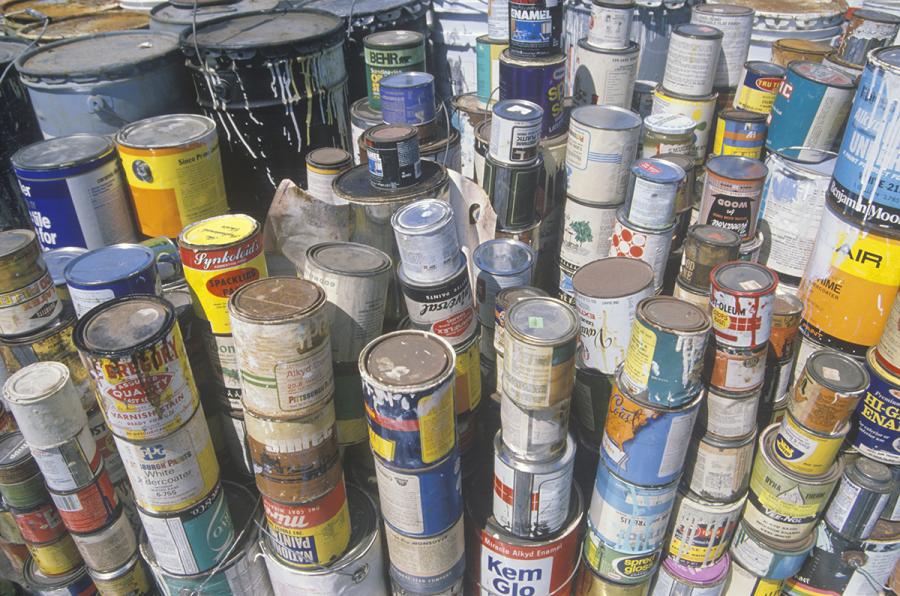 Old paint cans ready for disposal